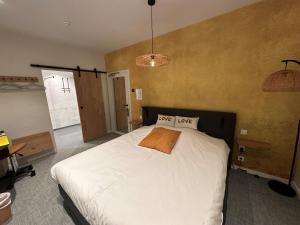 Postel nebo postele na pokoji v ubytování Hotel - B&B Elementum