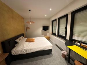 Postel nebo postele na pokoji v ubytování Hotel - B&B Elementum