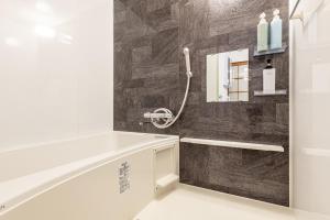 Een badkamer bij 吉房民宿 YOSHIFUSA House 晴空塔徒步圈 整栋出租