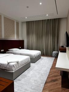 Postel nebo postele na pokoji v ubytování فندق الياس - Yas Hotel