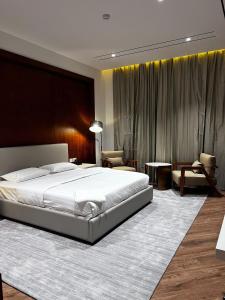 Postel nebo postele na pokoji v ubytování فندق الياس - Yas Hotel