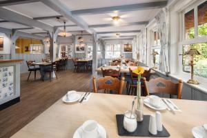 Veitingastaður eða matsölustaður á Kleinhuis Hotel Mellingburger Schleuse
