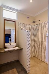 Koupelna v ubytování Sedia Hotel