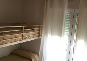 Posteľ alebo postele v izbe v ubytovaní Apartamento Mirador de Conil