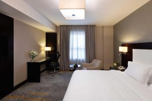 Letto o letti in una camera di Warwick Hotel Jeddah