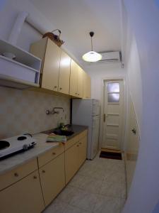 Kuchyňa alebo kuchynka v ubytovaní Mirto Apartments
