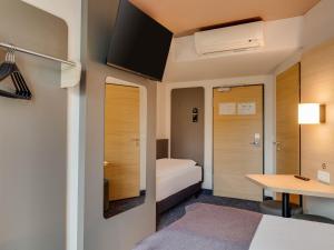 Postel nebo postele na pokoji v ubytování B&B Hotel Oldenburg