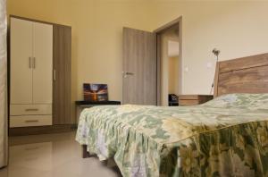 Postel nebo postele na pokoji v ubytování Praia Capital Residence Aparthotel + 34 fotografií