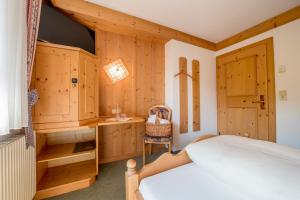 Postel nebo postele na pokoji v ubytování Landhotel Älpili