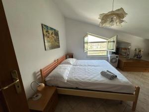 Letto o letti in una camera di Casetta a Cavarretta