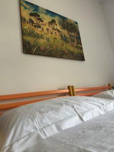 Letto o letti in una camera di Casetta a Cavarretta