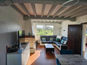 Χώρος καθιστικού στο Grande maison normande, vue mer à 75 metres de la plage, équipé spa de nage
