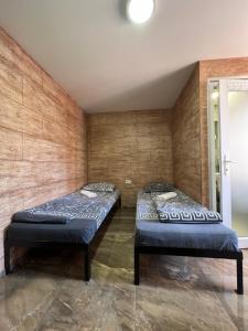 Postel nebo postele na pokoji v ubytování Berić Rooms