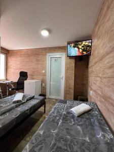 TV a/nebo společenská místnost v ubytování Berić Rooms + 37 fotografií