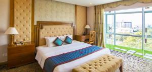 Postel nebo postele na pokoji v ubytování Petro Hotel + 20 fotografií