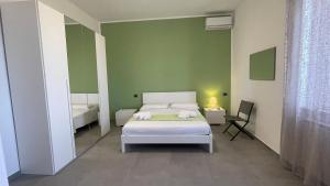 Postel nebo postele na pokoji v ubytování Casolare Berchicci