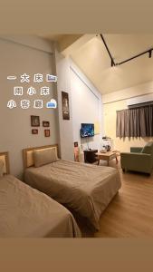 Giường trong phòng chung tại 森林寓 自助入住