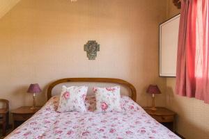 En eller flere senge i et værelse på Magnífica villa con piscina y barbacoa