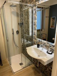 Et badeværelse på PARCO VERDE APARTMENT