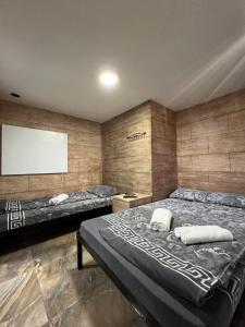Postel nebo postele na pokoji v ubytování Berić Rooms