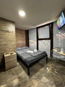 Postel nebo postele na pokoji v ubytování Berić Rooms
