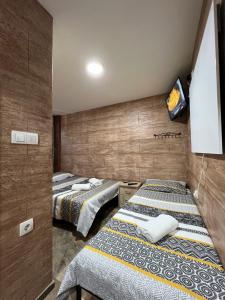 Postel nebo postele na pokoji v ubytování Berić Rooms