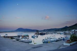 a group of boats are docked in a harbor at Sky view in Konístrai