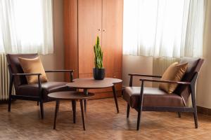Posedenie v ubytovaní Hôtel Argo