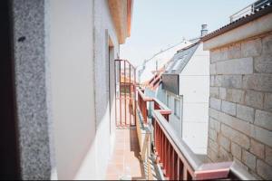 an image of a balcony of a building at Ondas do Mar Boutique Stays - Portonovo 5 in Portonovo