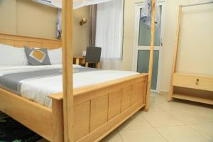 Postel nebo postele na pokoji v ubytování Jade Hotel