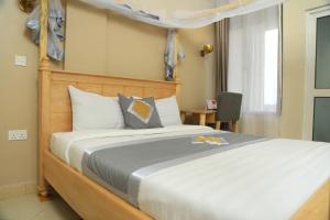 Postelja oz. postelje v sobi nastanitve Jade Hotel