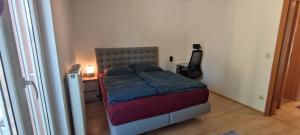 Postel nebo postele na pokoji v ubytování Helle Zwei Zimmer Wohnung Nähe Zentrum Schärding
