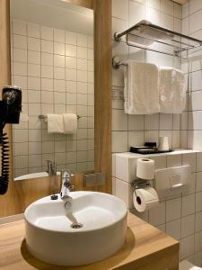 Koupelna v ubytování Best Western Hotel Baars + 37 fotografií