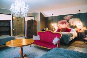 The Bohemian Guesthouse客房内的一张或多张床位