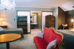 The Bohemian Guesthouse客房内的一张或多张床位