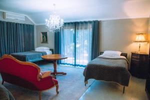 The Bohemian Guesthouse客房内的一张或多张床位