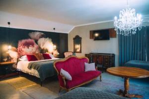 The Bohemian Guesthouse客房内的一张或多张床位