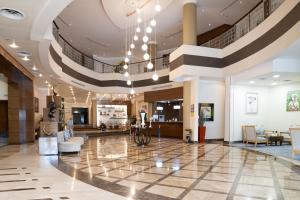Vstupní hala nebo recepce v ubytování Golden Tulip Hotel Buraidah Al Qassim + 77 fotografií