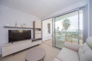 TV/trung tâm giải trí tại Holamar Luxury Apartment - Inmodream Calpe