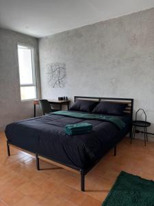 Postel nebo postele na pokoji v ubytování Eisei House