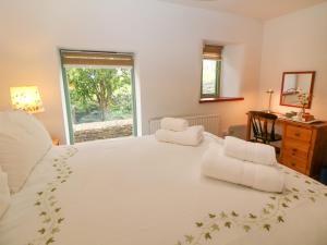 Postel nebo postele na pokoji v ubytování Temperance Croft