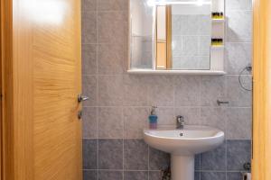 Kúpeľňa v ubytovaní Agnadi Blue Apartments