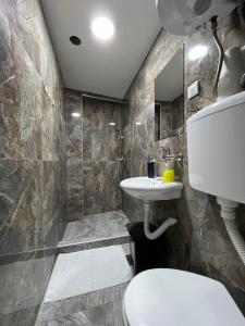 Koupelna v ubytování Berić Rooms