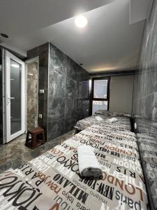 Postel nebo postele na pokoji v ubytování Berić Rooms