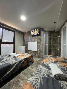 Postel nebo postele na pokoji v ubytování Berić Rooms