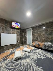 Postel nebo postele na pokoji v ubytování Berić Rooms