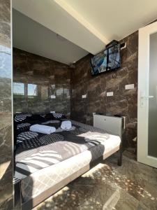 Postel nebo postele na pokoji v ubytování Berić Rooms