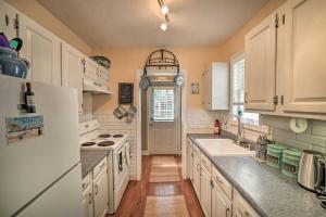 a kitchen with white appliances and a white refrigerator at Dreamcatchers in North Beach