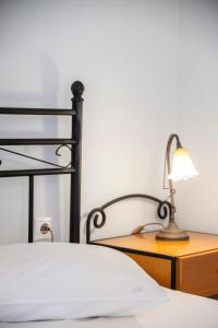 Posteľ alebo postele v izbe v ubytovaní Agnadi Blue Apartments