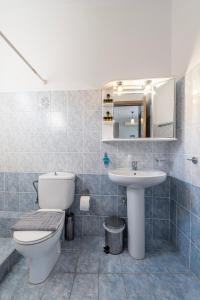 Kúpeľňa v ubytovaní Agnadi Blue Apartments